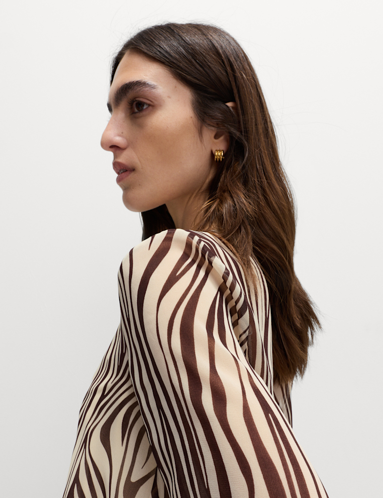 Zebra Print Tie Front Flute Sleeve Blouse